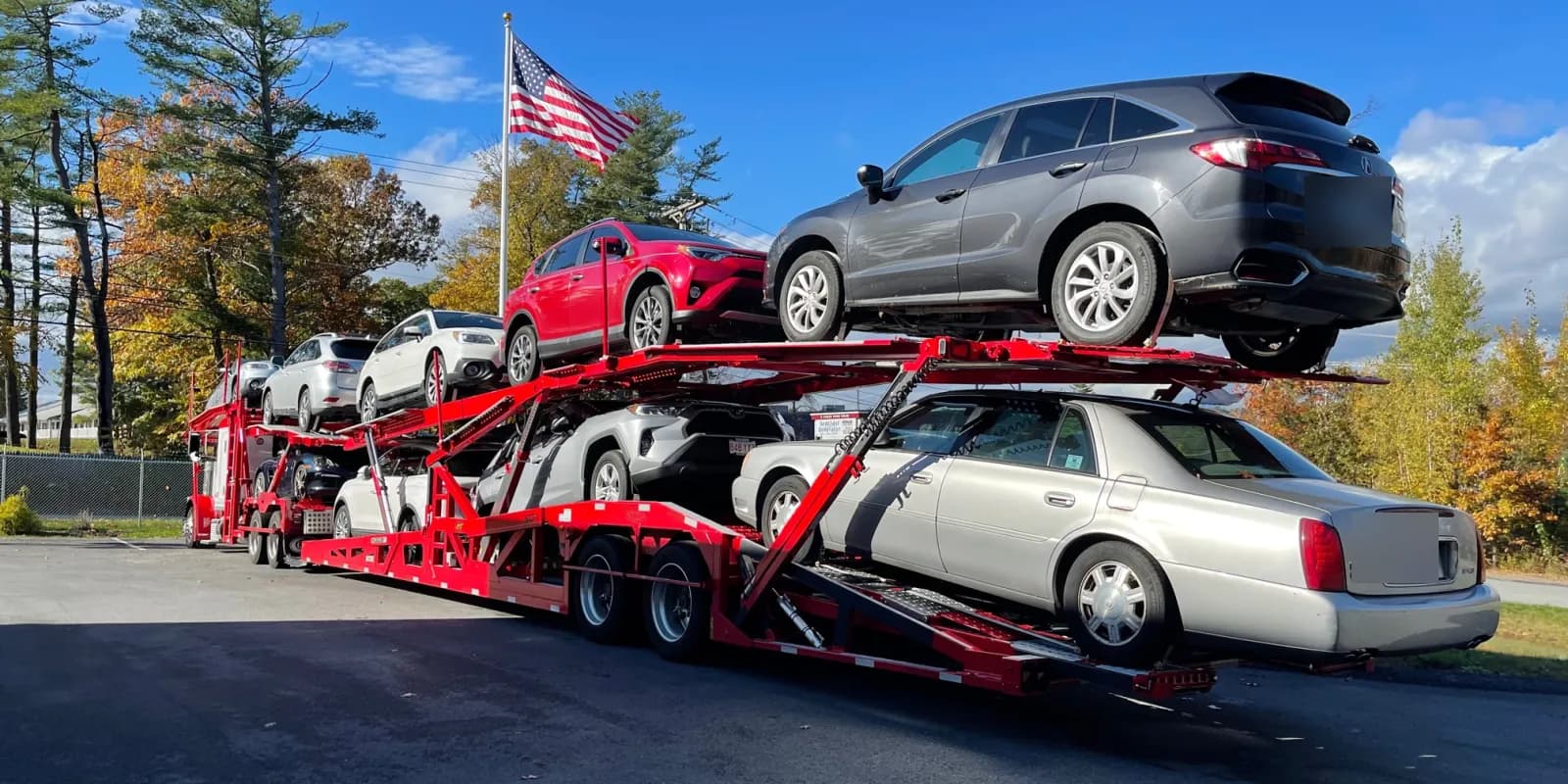 Military vehicle transport by Baier Transport: car carriers loaded for PCS moves