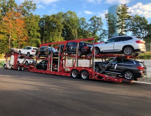 Car carrier on highway for nationwide auto shipping