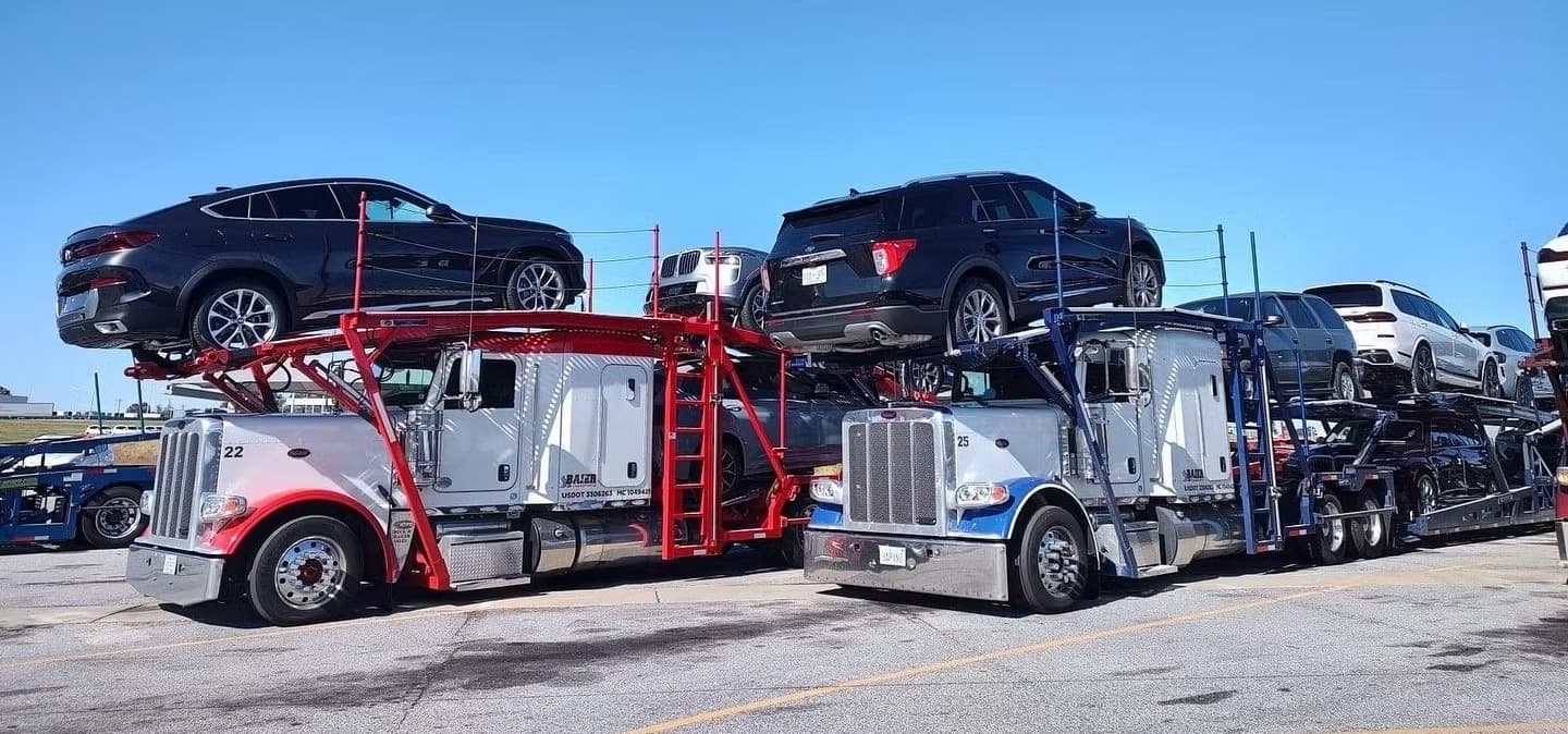 Baier Transport car carriers at facility