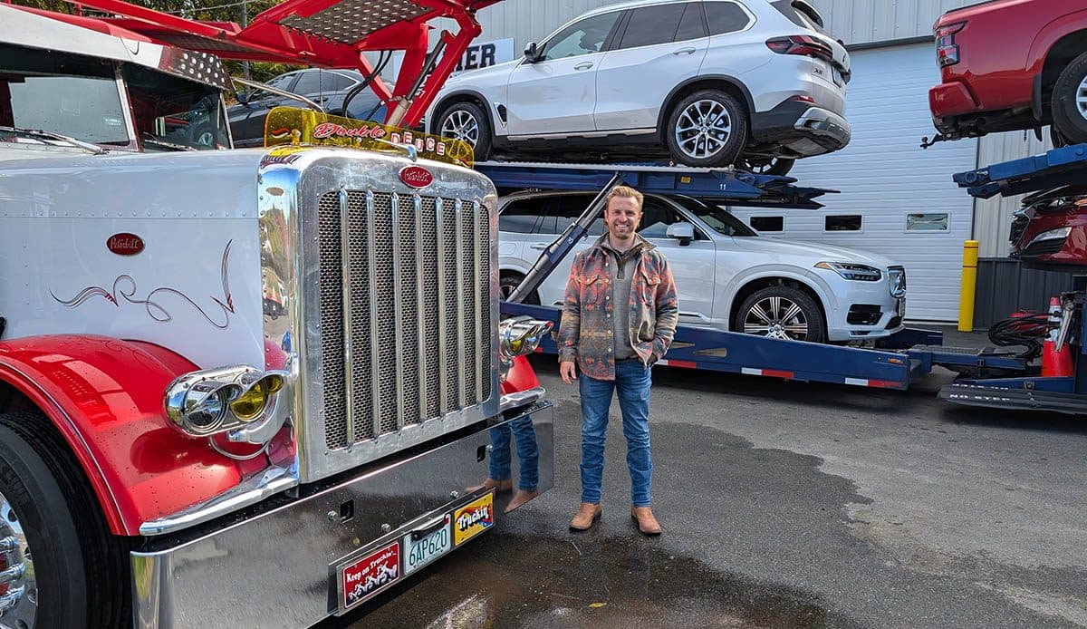 Jay Baier, Baier Transport, in front of company truck